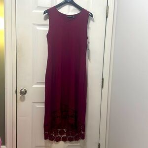 Burgundy, short sleeve high low, long dress with lace detail on bottom hem.